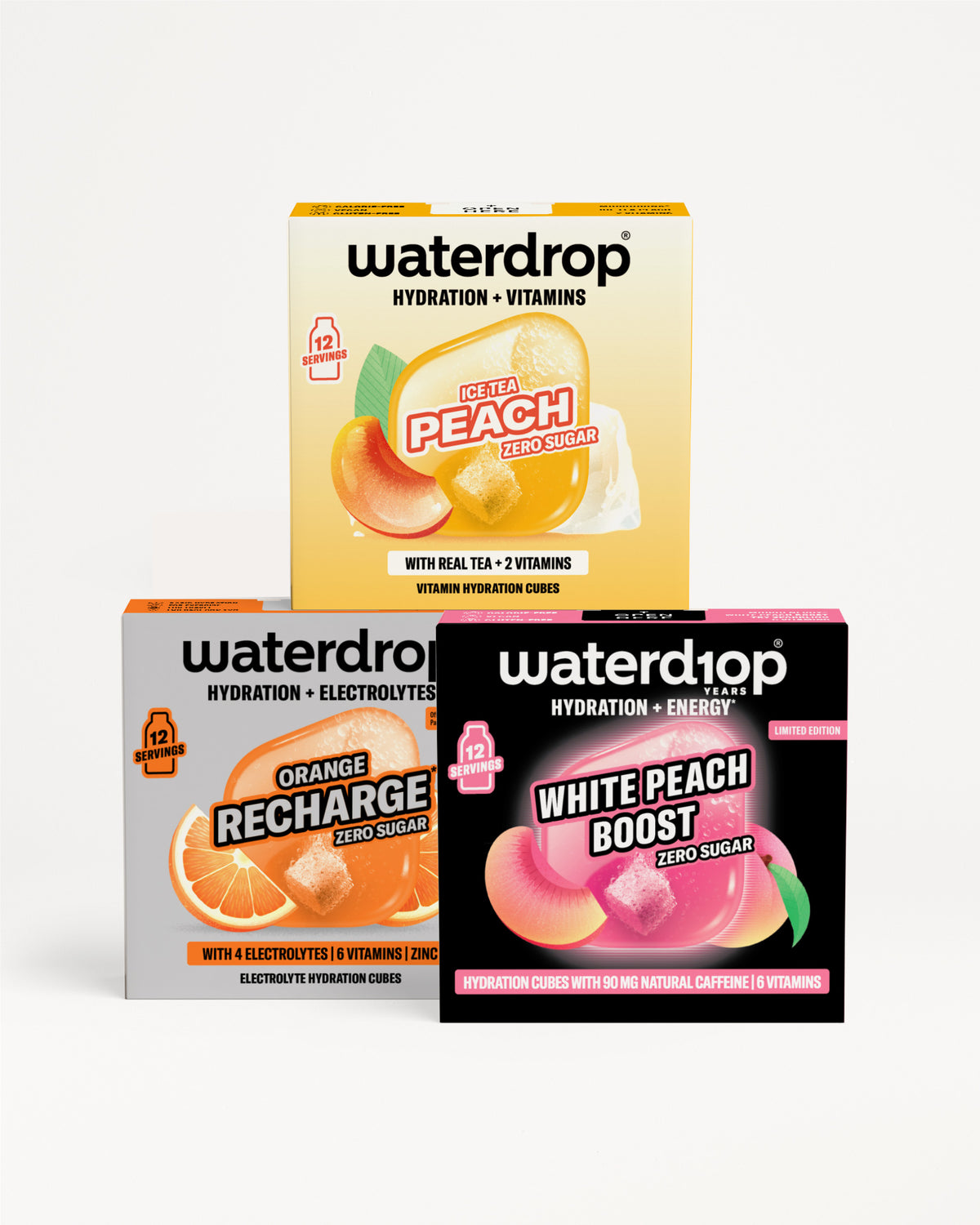Trei cutii Waterdrop pentru hidratare și vitamine în arome piersică, Recharge portocaliu și White Peach Boost, toate împăturite pe fundal alb.