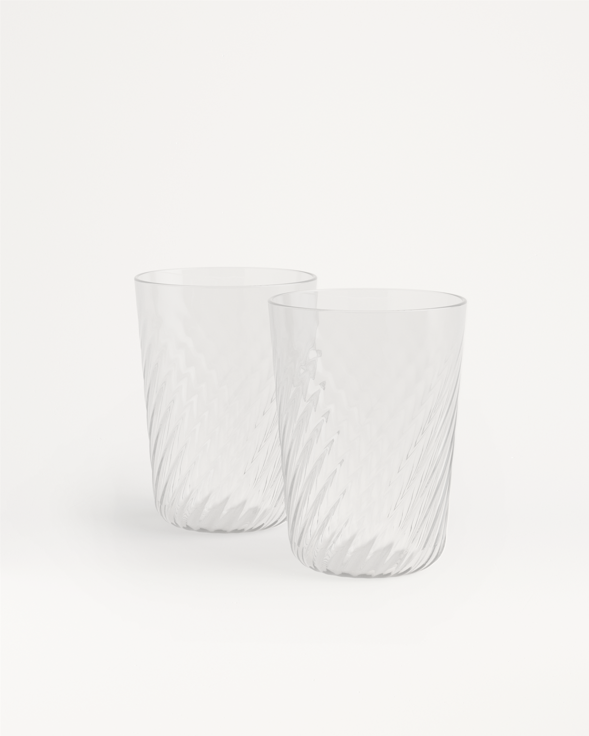 Două pahare transparente din sticlă cu model spiral, fiecare cu o capacitate de 330 ml, așezate pe fundal alb.