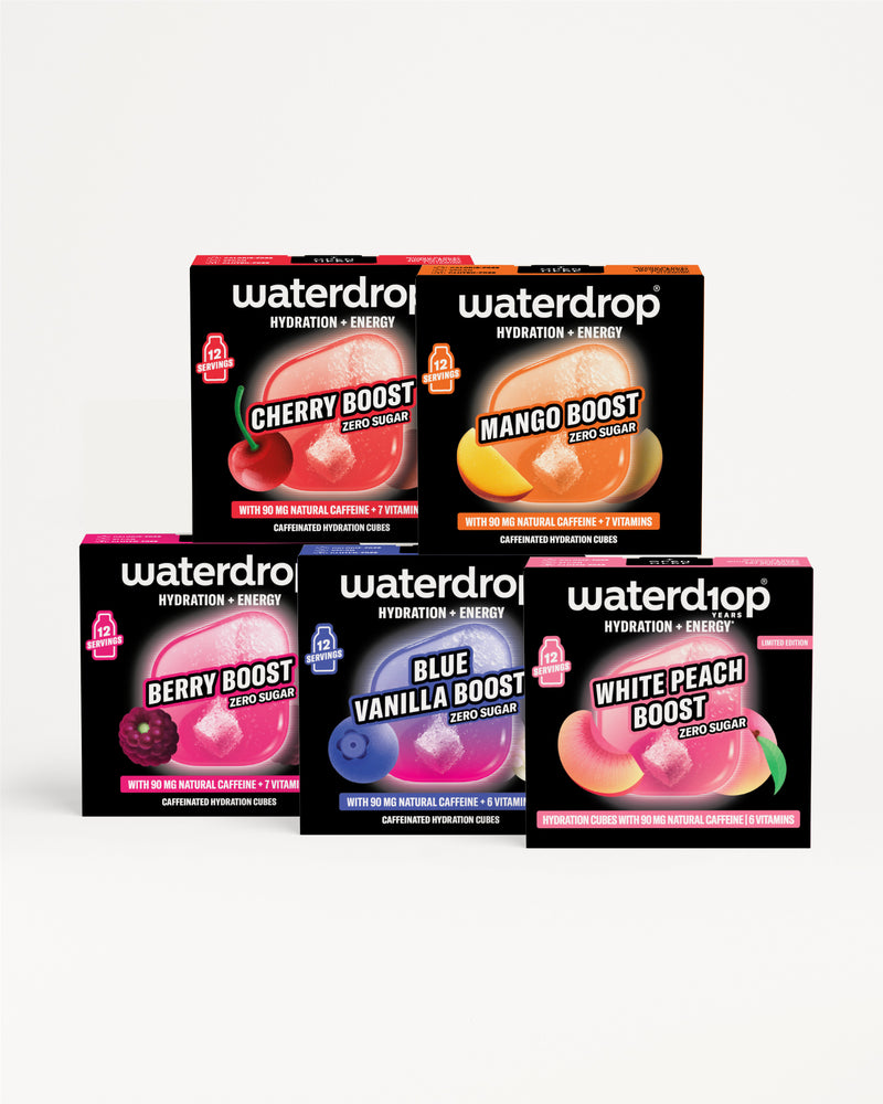 Cutii Waterdrop de hidratare și energie cu arome diferite, puse pe un fundal alb.