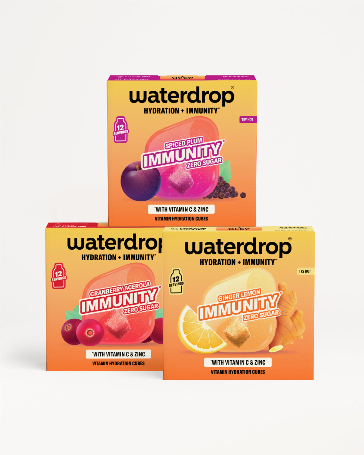 Trei cutii Waterdrop hidratare și imunitate așezate în formă de piramidă, cu ilustrații colorate de fructe.